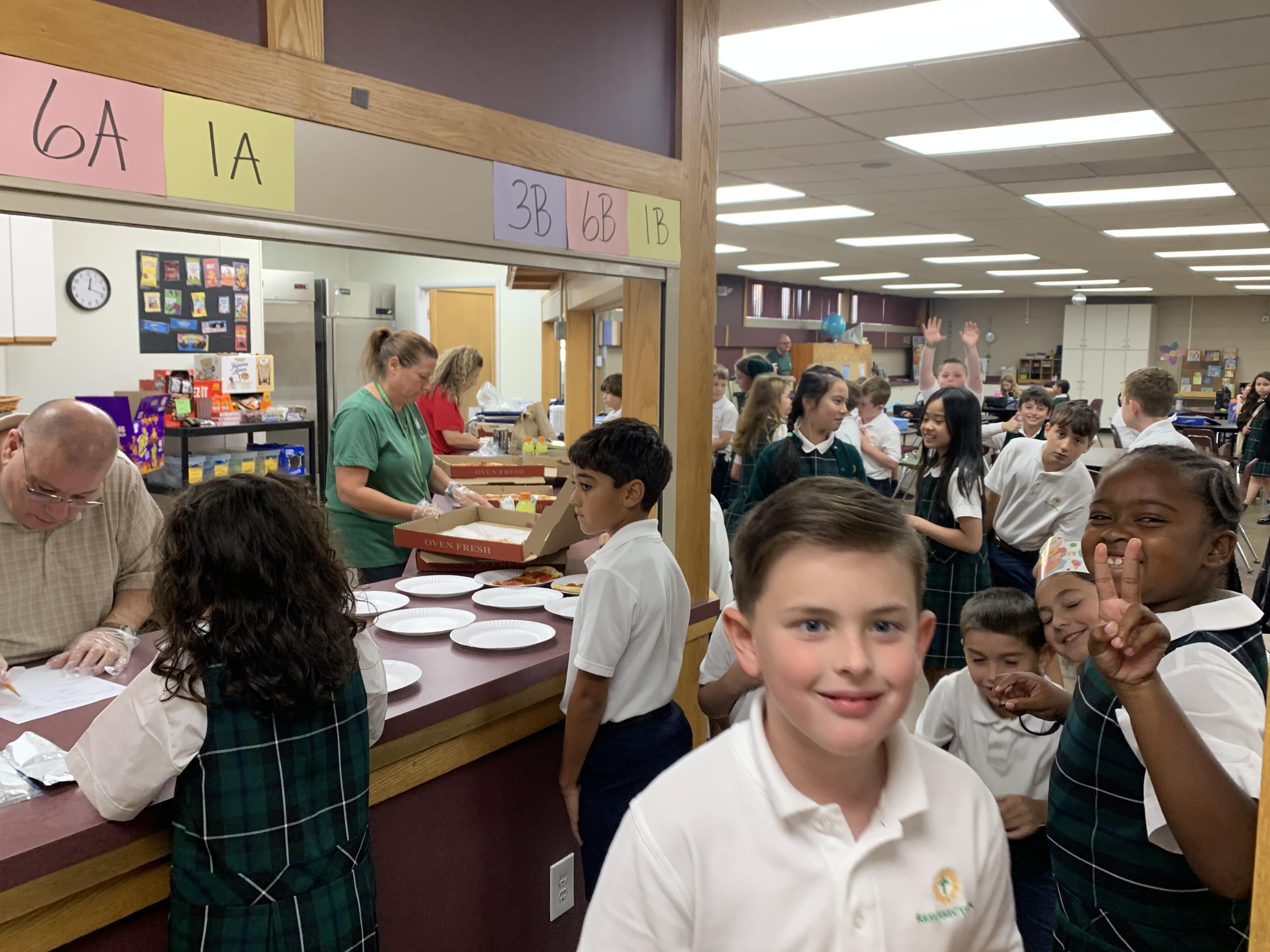 Students lined up in the lunch room